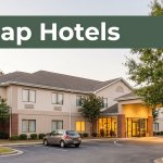 Roadside hotel with a compact car, glowing lobby, trees, and a dark-green banner reading “Cheap Hotels.”