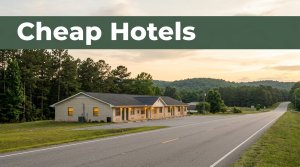 A modest roadside motel lit by golden hour sun beside a quiet highway.