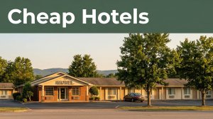 A roadside motel with a parked car, trees, and foothills at sunset.