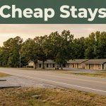 A modest roadside motel along a rural Alabama highway at sunset.