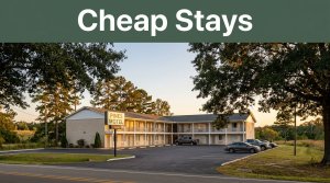 A warm roadside motel along a quiet rural Alabama highway during sunset.
