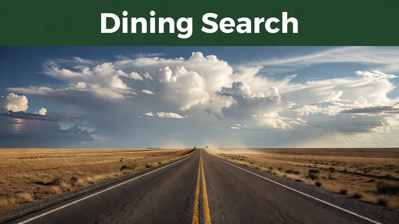 A lonely rural road leads to the horizon beneath a sky with a bold Dining Search sign.