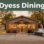 A roadside diner with warm windows, a parked car, and a green Dyess Dining headline band.