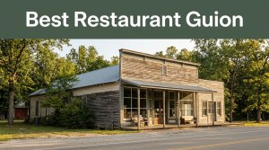 A rural Arkansas general store and lodging building beside a tree-lined road.