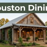 Rustic restaurant exterior with warm windows, greenery, and a green Houston Dining banner.