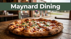 Fresh artisan pizza on a wooden table in a cozy Arkansas pizzeria.