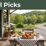 Outdoor café table with fried chicken, vegetables, and coffee in rural Arkansas.