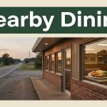A roadside Arkansas diner beside a rural highway at sunset.