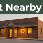 A brick family restaurant glowing at dusk in Prairie Grove, Arkansas, with an Eat Nearby headline.