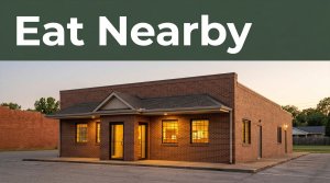 A brick family restaurant glowing at dusk in Prairie Grove, Arkansas, with an Eat Nearby headline.