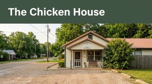 A Southern roadside restaurant with a clear entrance and greenery.