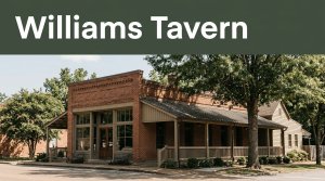 Historic Williams Tavern in Washington, Arkansas, with a brick facade and shaded porch.