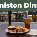 Barbecue, fries, iced tea, and a folded map sit on a downtown Anniston restaurant table.