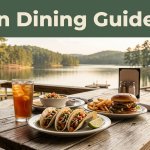 A meal of tacos, a burger, fries, and iced tea sits before an Arkansas lake.
