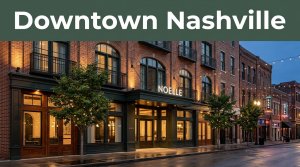 Boutique hotel facade on a downtown Nashville street beneath a dark-green Downtown Nashville banner.