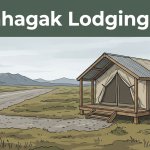 A tent cabin beside a gravel airstrip in the Alaskan tundra.