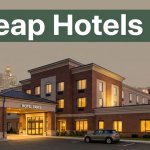 Downtown Springfield hotel with evening lights, skyline, parked car, and a green Cheap Hotels banner.