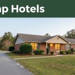 A roadside motel with warm windows and a quiet highway.