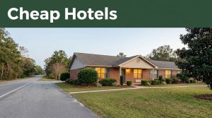 A roadside motel with warm windows and a quiet highway.