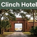 Red-brick Fort Clinch entrance beneath trees with Amelia Island beach and ocean beyond.