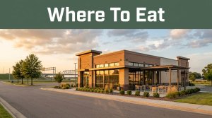 A modern roadside restaurant beneath a green Where To Eat banner.