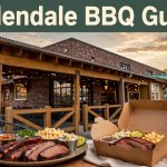 A barbecue restaurant exterior with a meal and takeout box in front.