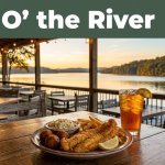 Seafood dinner and iced tea overlooking Lake Guntersville at sunset.