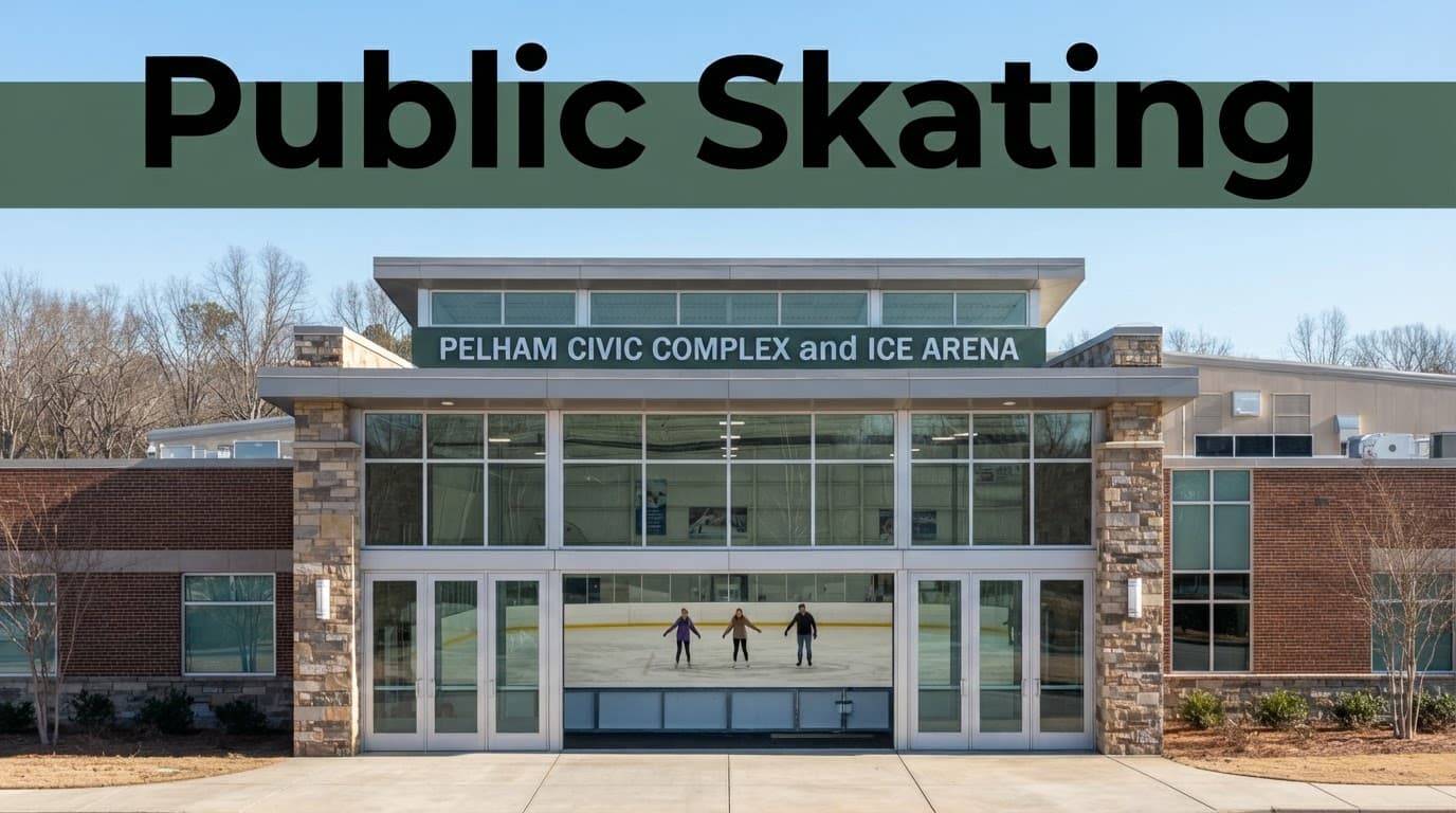 Pelham ice arena entrance with three distant skaters visible through glass.