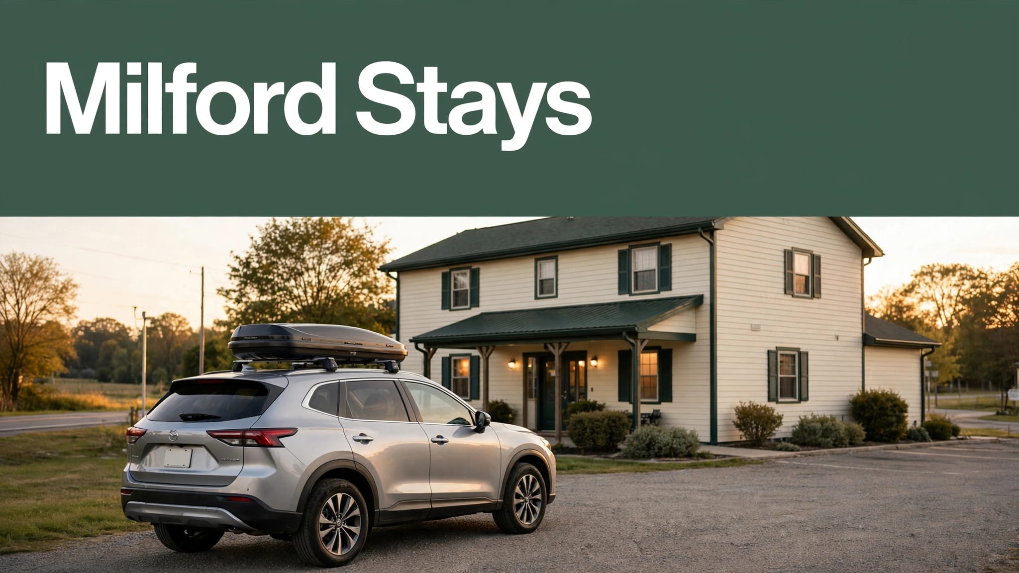 A roadside hotel with a parked car and a green Milford Stays banner.