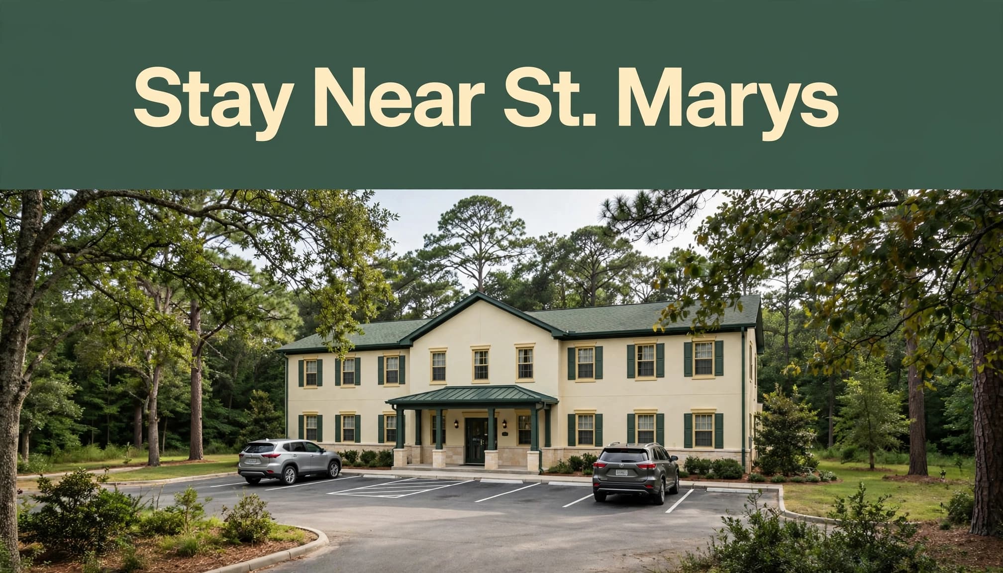 Low-rise hotel with guest parking and mature trees in Southern Maryland.